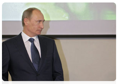 Vladimir Putin speaking at a news conference following the International Tiger Conservation Forum