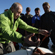 Vladimir Putin fixing components in place with precise movements