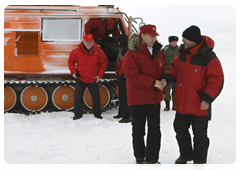Vladimir Putin arrives at Alexandra Land, an island of the Franz Josef Land Archipelago