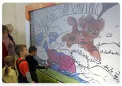 Visitors could paint an Amur tiger on a three-metre digital screen